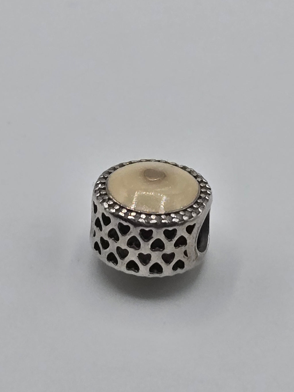 Preloved Pandora Two Tone Cream Enamel Heart Charm, S925 ALE sterling silver and 14K gold, close up
