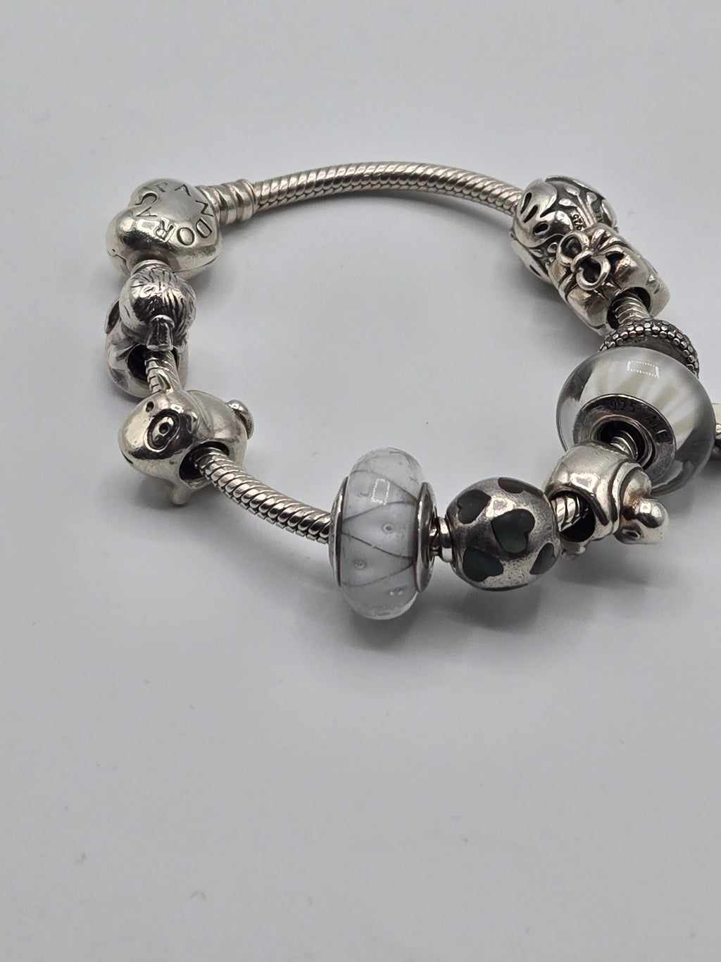 Preloved Pandora Heart Clasp Bracelet with 9 Charms 17cm, S925 ALE sterling silver, close up