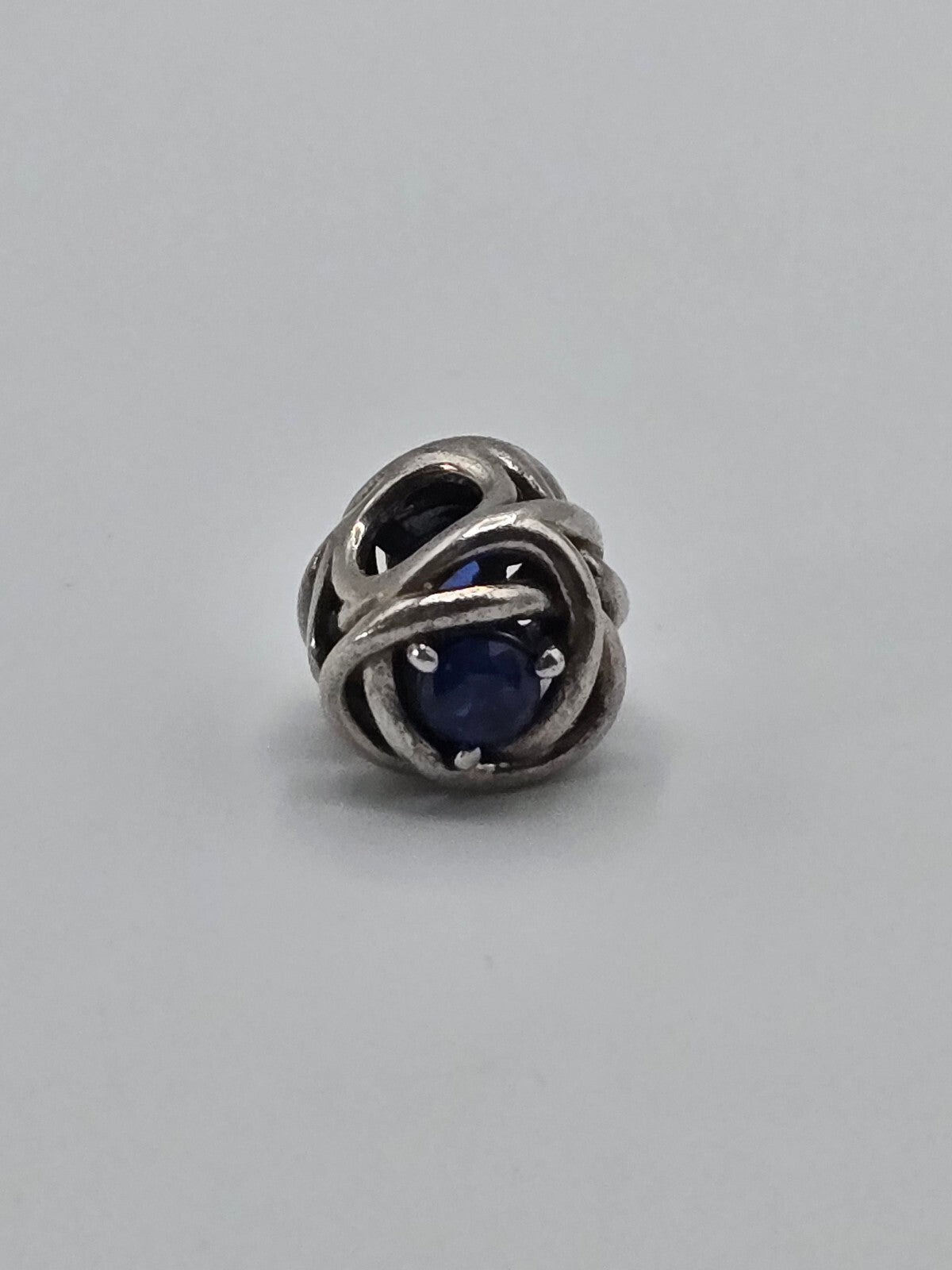 Pandora Openwork Knot Charm with Blue Stone