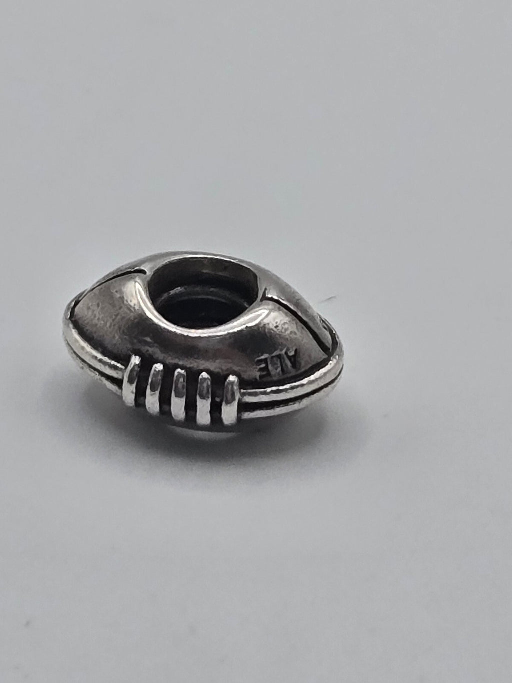 Preloved Pandora American Football Charm, S925 ALE sterling silver, back view showing hallmark