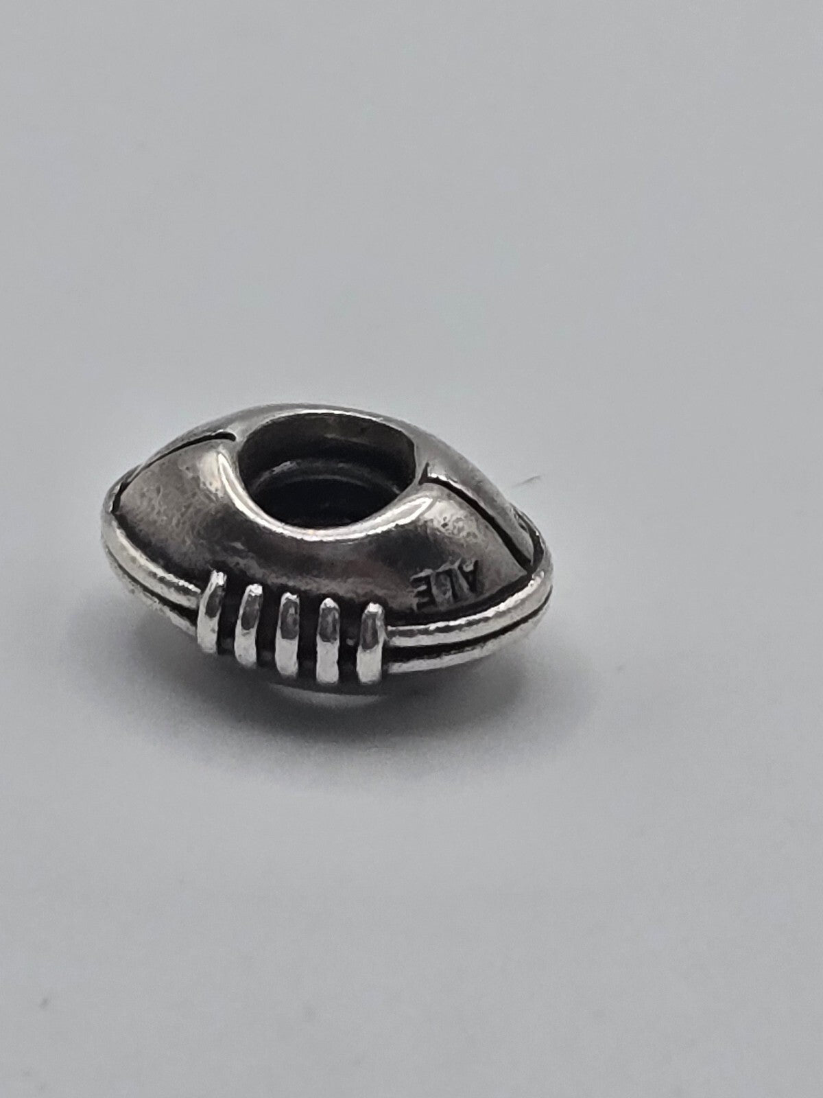 Preloved Pandora American Football Charm, S925 ALE sterling silver, back view showing hallmark