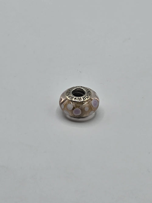 Pandora Amber Lilac Polka Dot Murano Glass Charm on a plain light background