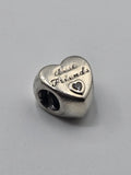 Pandora Best Friends Heart Charm on a plain light background