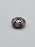 Pandora Black and Lilac Petal Murano Glass Charm on a plain light background