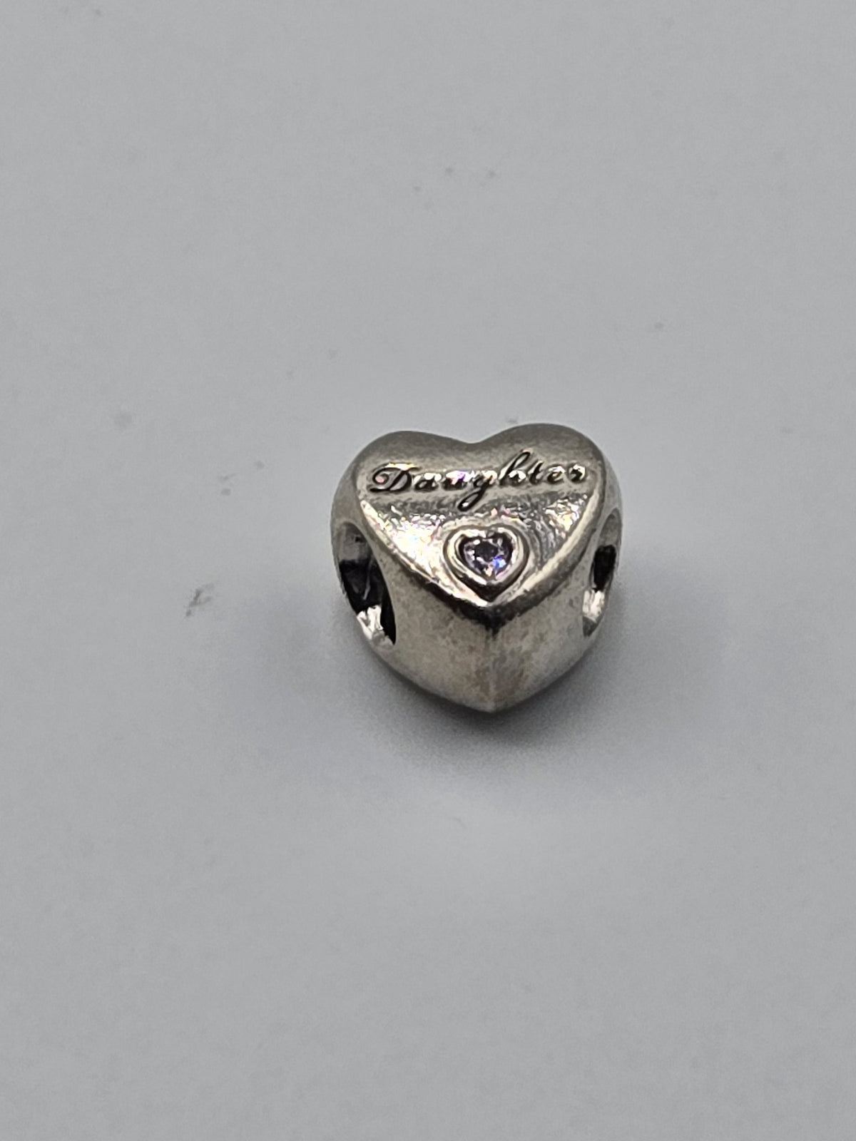 Pandora Daughter's Love Heart Charm on a plain light background
