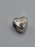 Pandora Daughter's Love Heart Charm on a plain light background