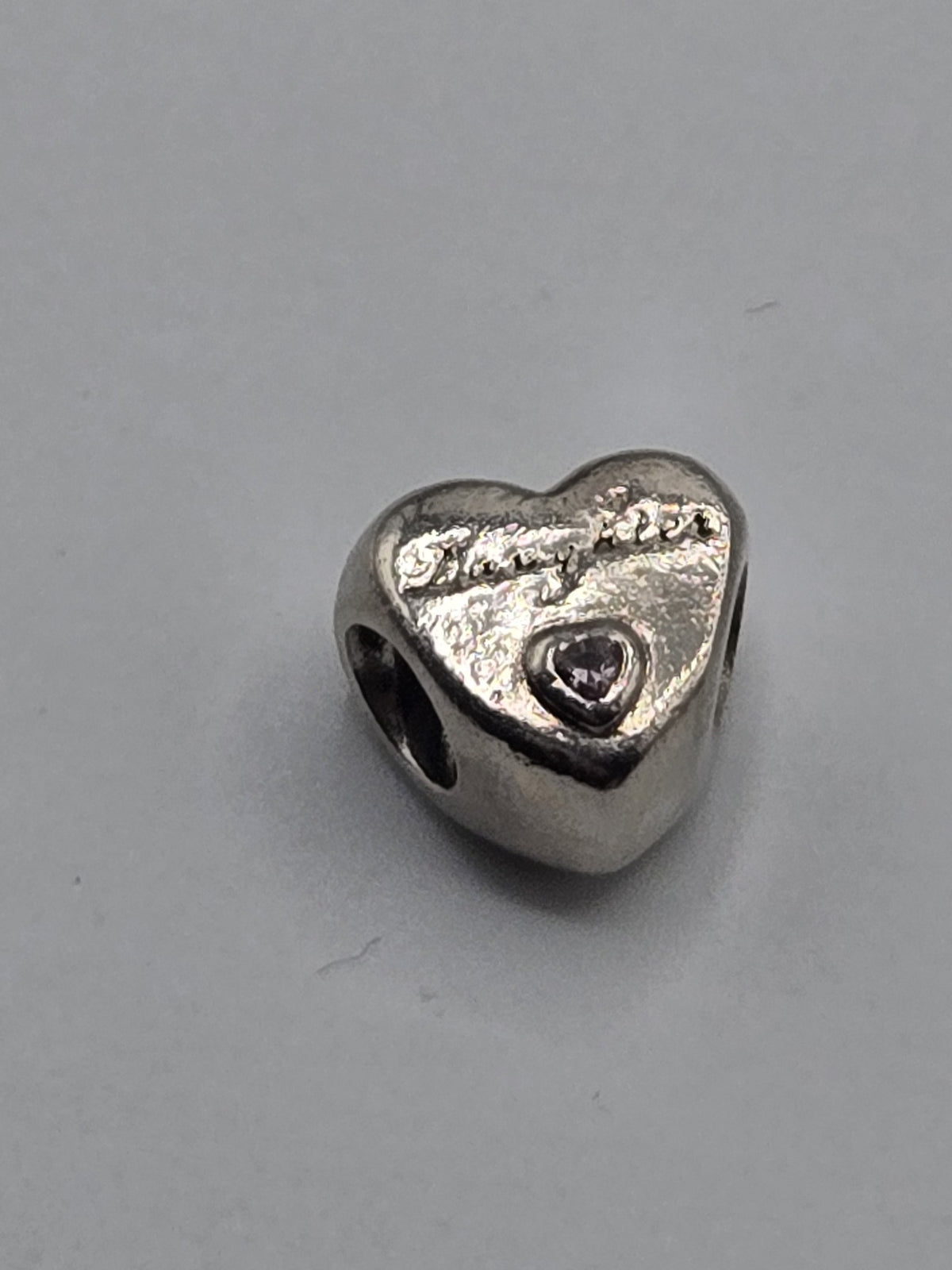 Pandora Daughter's Love Heart Charm on a plain light background