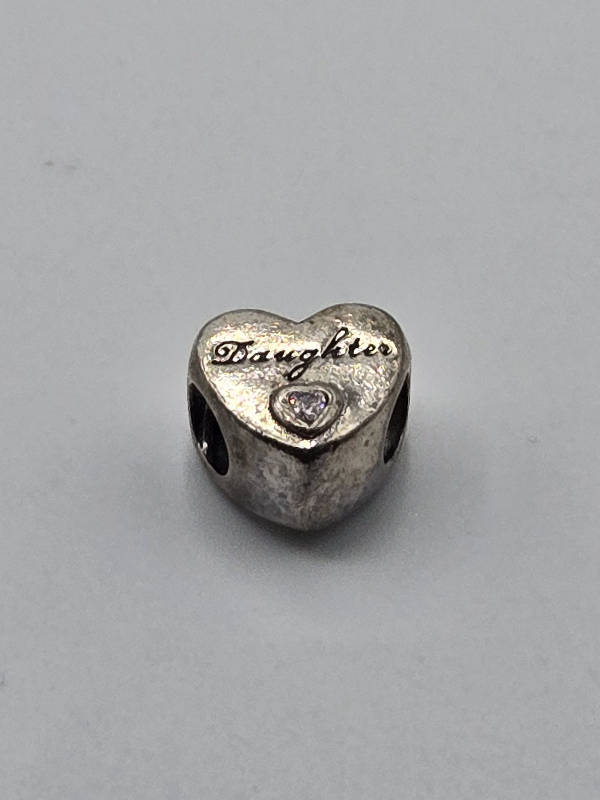 Pandora Daughter's Love Heart Charm on a plain light background