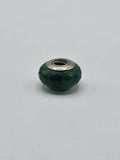 Pandora Emerald Green Faceted Murano Glass Charm on a plain light background