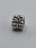 Pandora Gift Box Charm on a plain light background