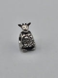 Pandora Giraffe Charm on a plain light background