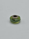 Pandora Lime Green and Turquoise Swirl Murano Glass Charm on a plain light background
