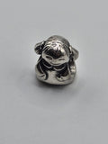 Pandora Little Girl with Bunches Charm on a plain light background