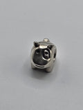 Pandora Little Pig Charm on a plain light background