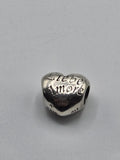 Pandora Love Languages Heart Charm on a plain light background