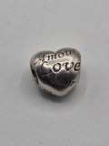 Pandora Love Languages Heart Charm on a plain light background