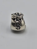 Pandora Money Bag Charm on a plain light background