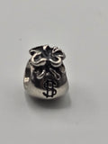 Pandora Money Bag Charm on a plain light background