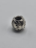 Pandora Openwork Leaf Charm on a plain light background