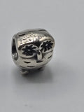 Pandora Owl Charm on a plain light background