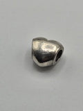 Pandora Polished Heart Charm on a plain light background