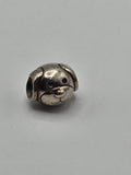 Pandora Puppy Face Charm on a plain light background