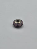 Pandora Purple and Pink Petal Faceted Murano Glass Charm on a plain light background