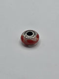 Pandora Red and Blush Heart Murano Glass Charm on a plain light background