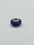 Pandora Royal Blue Ribbed Murano Glass Charm on a plain light background