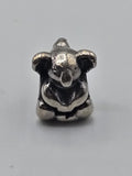 Pandora Sitting Elephant Charm on a plain light background
