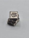 Pandora Study Books Charm on a plain light background