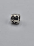 Pandora Sun and Moon Charm on a plain light background