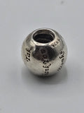 Pandora Thank You Charm on a plain light background