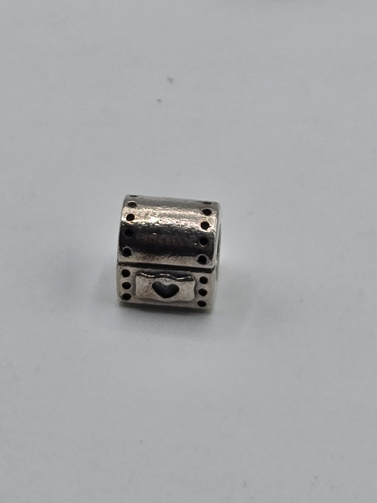Pandora Treasure Chest Charm on a plain light background