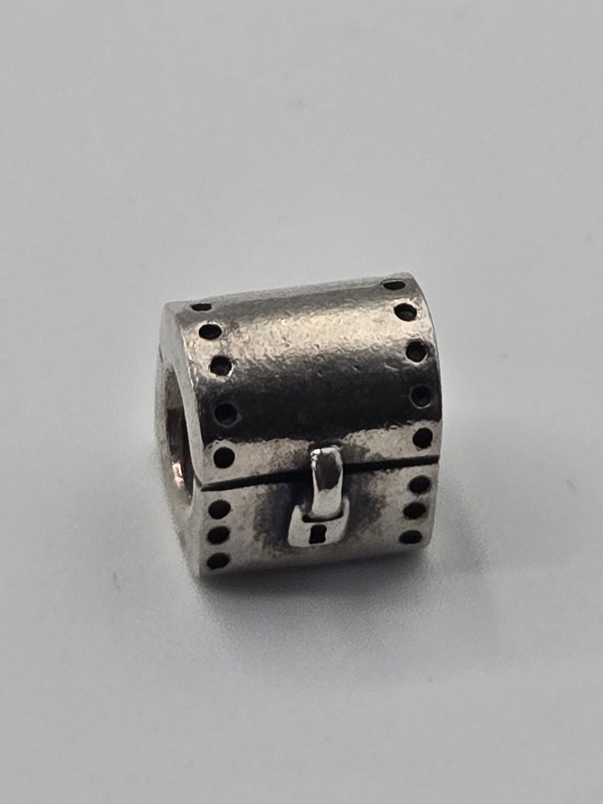 Pandora Treasure Chest Charm with Clasp on a plain light background