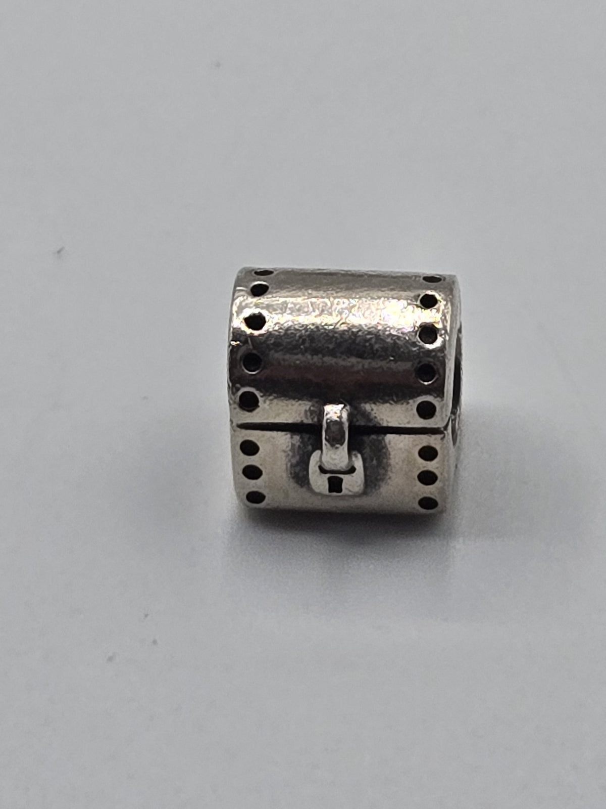 Pandora Treasure Chest Charm with Clasp on a plain light background