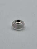 Pandora White Floral Murano Glass Charm with Red Accents on a plain light background